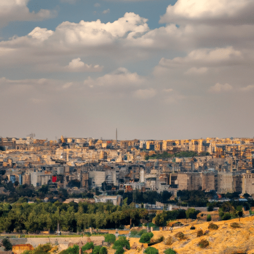 A panoramic view of Gaziantep showcasing its vast green areas interspersed with traditional architecture.