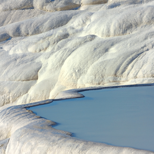 1. A stunning panoramic view of the white terraces of Pamukkale, glistening in the sunlight.