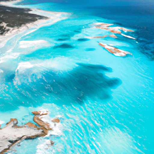 An aerial shot of the Turquoise Coast, showcasing the vivid blue waters contrasted with the rugged coastline