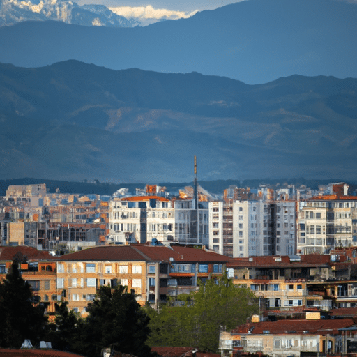 1. An image showing a panoramic view of Denizli, highlighting a mix of traditional and modern buildings.