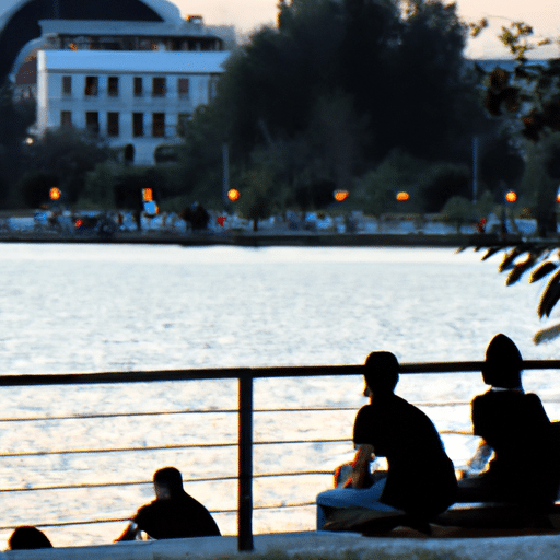 'A serene image of locals enjoying an evening by the Seyhan River, capturing the city's tranquil side.'