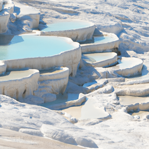 1. A panoramic view of Pamukkale's white travertine terraces gleaming under the sun.